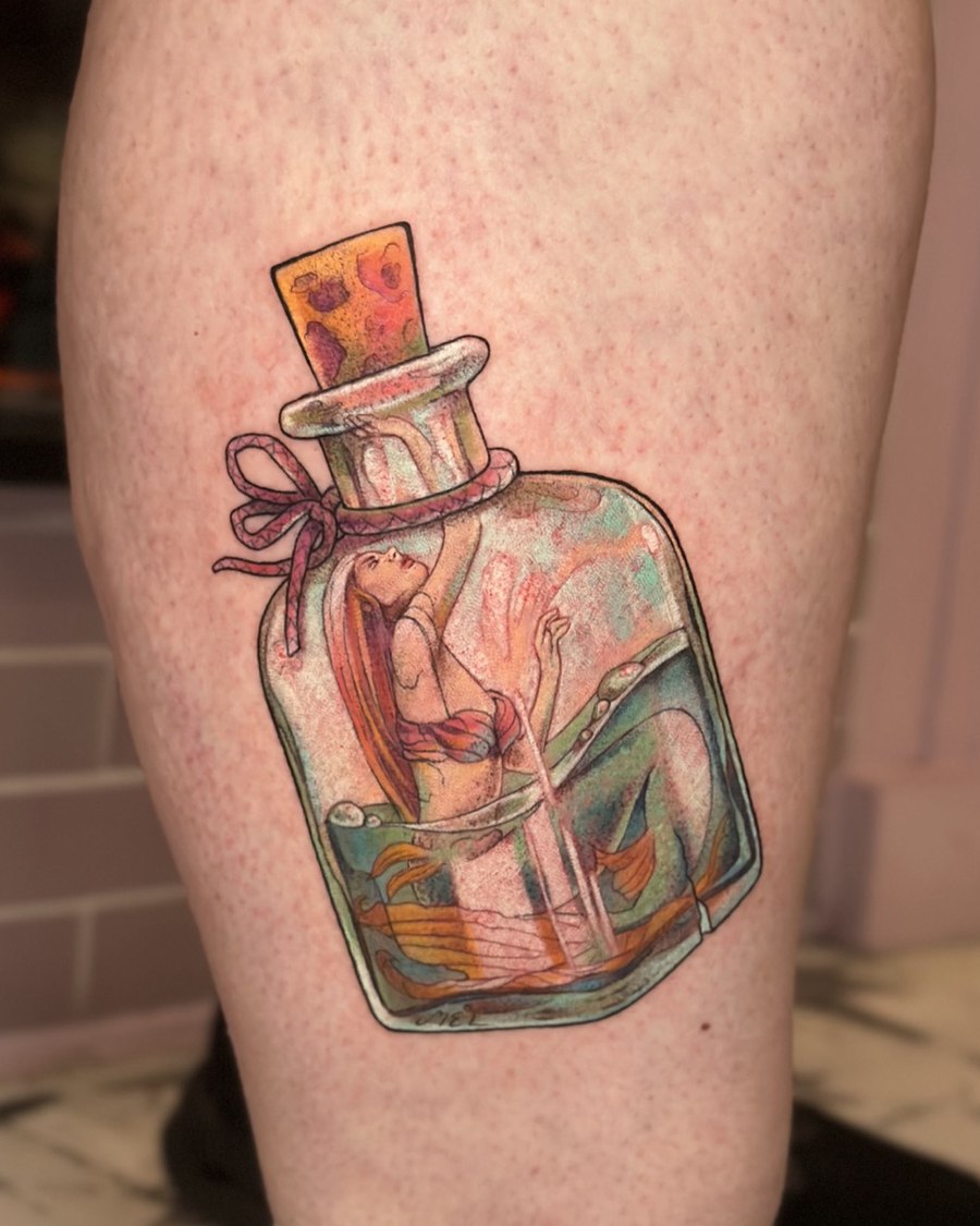 Mermaid in a corked bottle tattoo