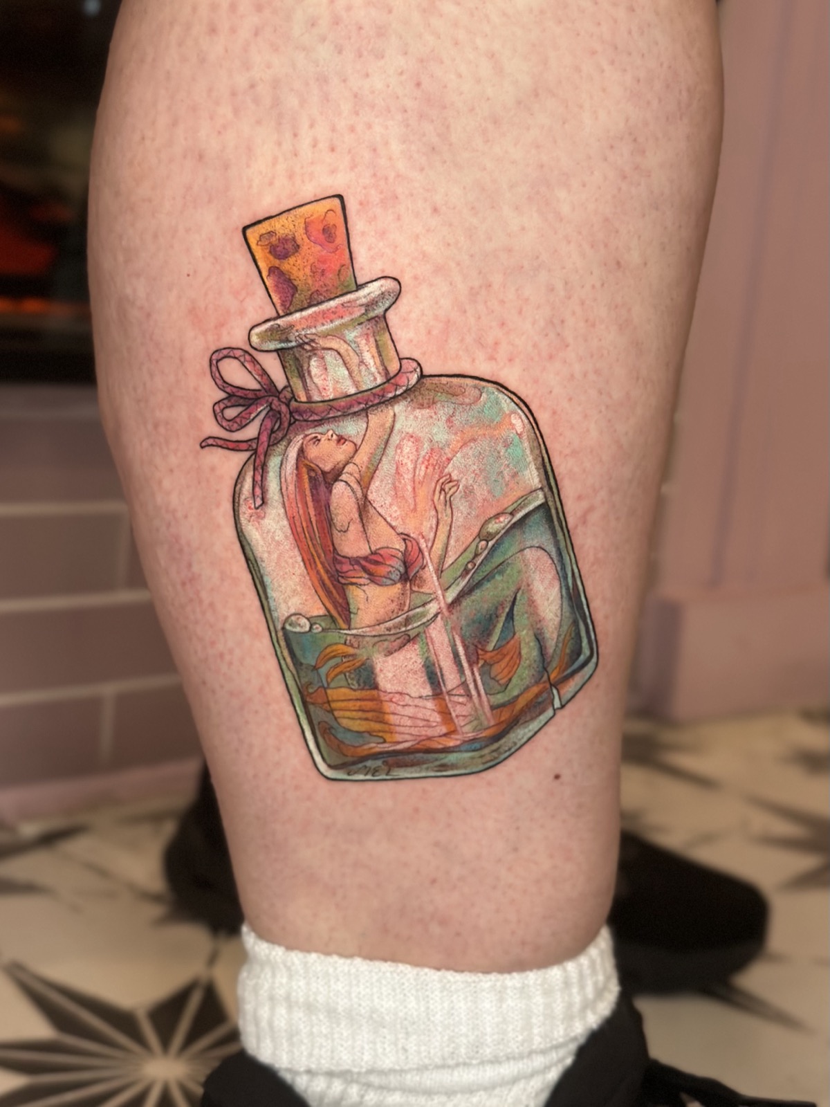 Mermaid in a Bottle tattoo
