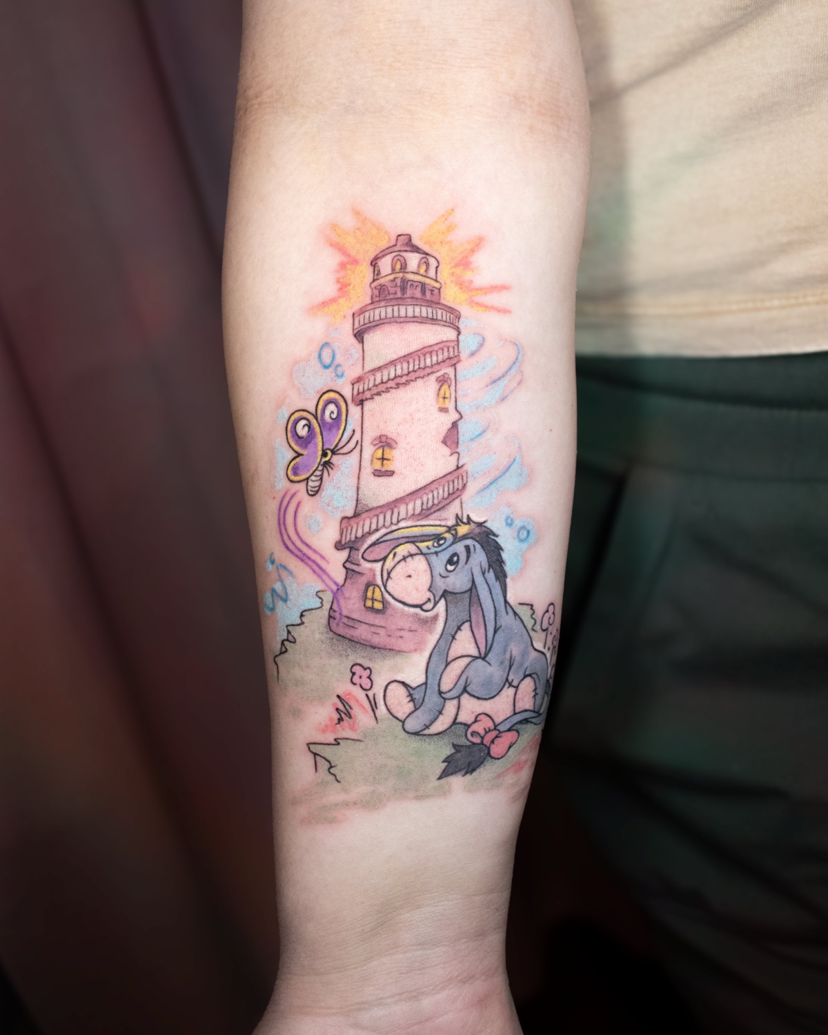 Lighthouse & Eeyore tattoo