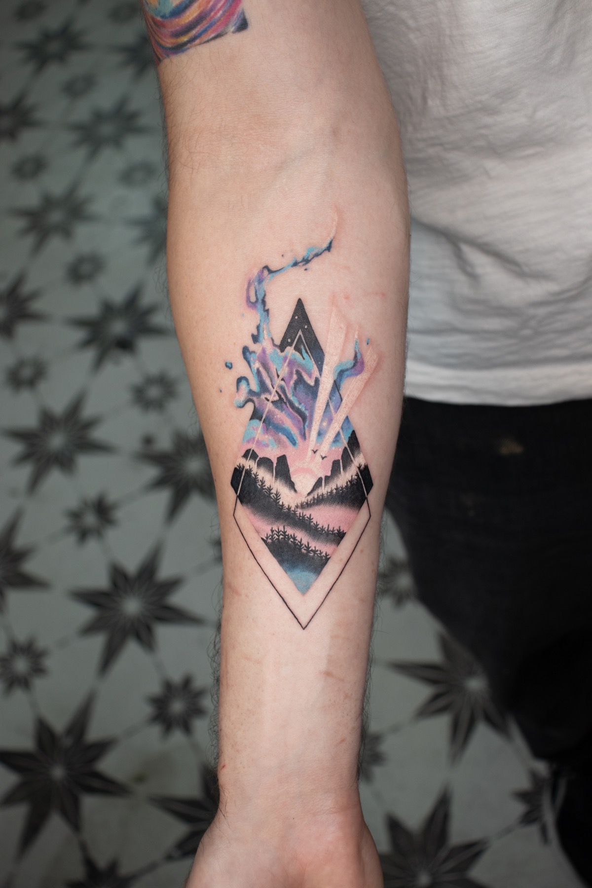 Mountain in a Diamond tattoo