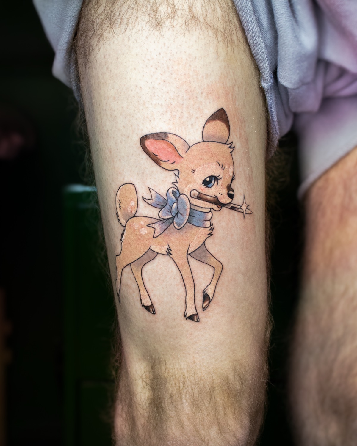 Fawn with a Switchblade tattoo